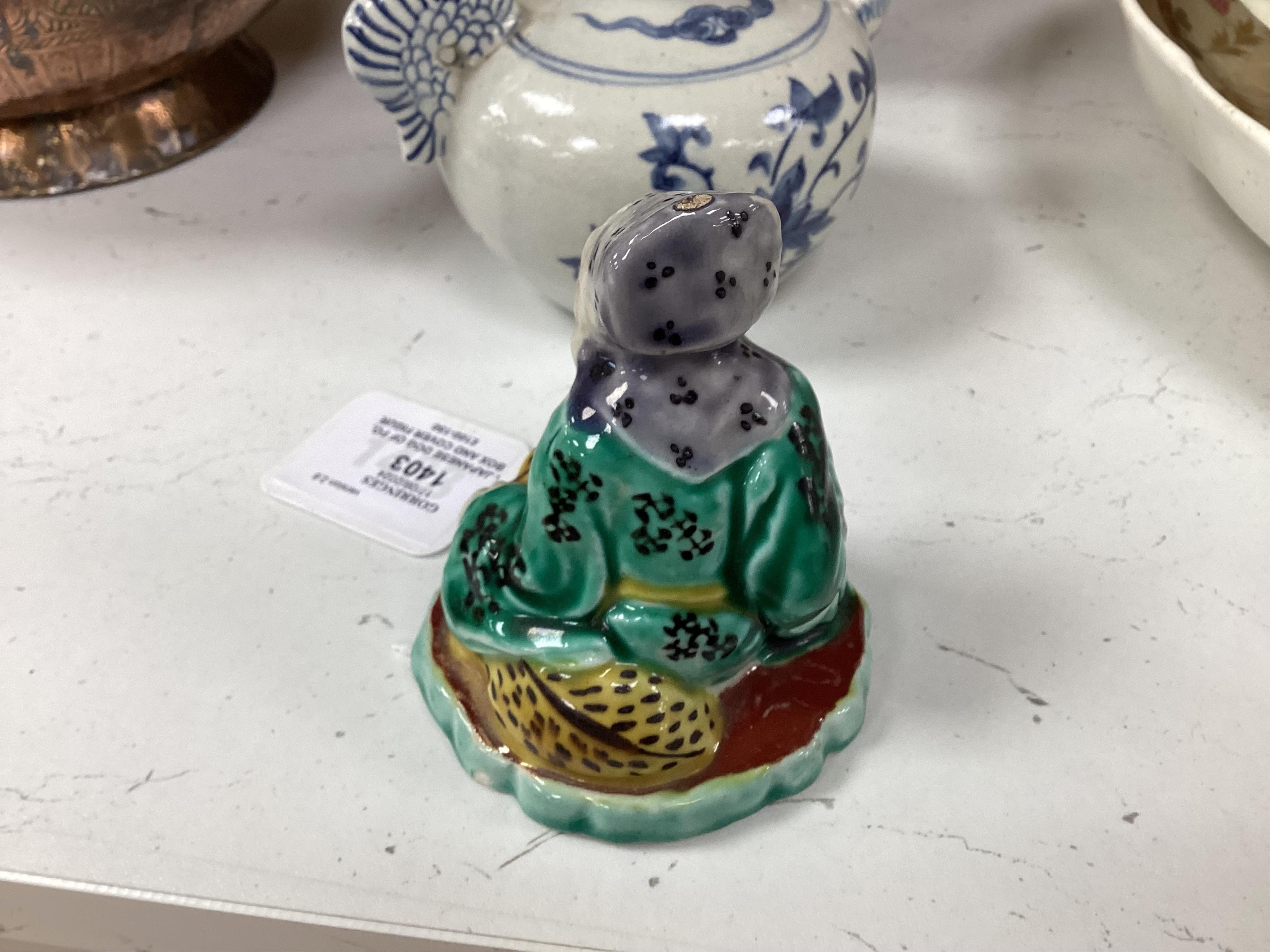 A Japanese Dog of Fo, a box and cover figure and blue and white pourer, Dog of Fo, 25cm high